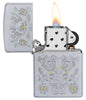 Painted Floral Satin Chrome Windproof Lighter with its lid open and lit