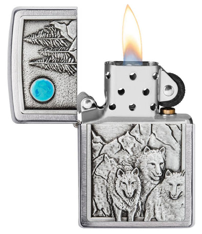 Wolf Pack and Moon Emblem Brushed Chrome Windproof Lighter with its lid open and lit