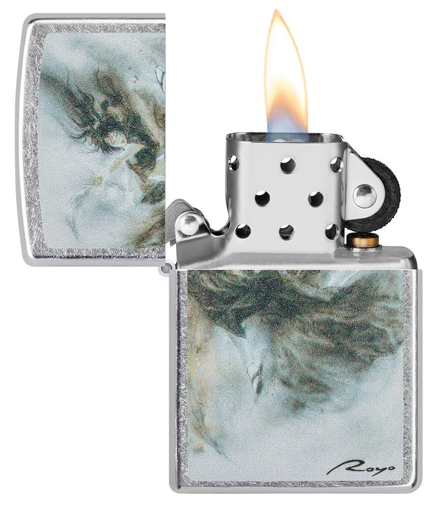 Luis Royo Design Street Chromeâ„¢ Windproof Lighter with its lid open and lit.