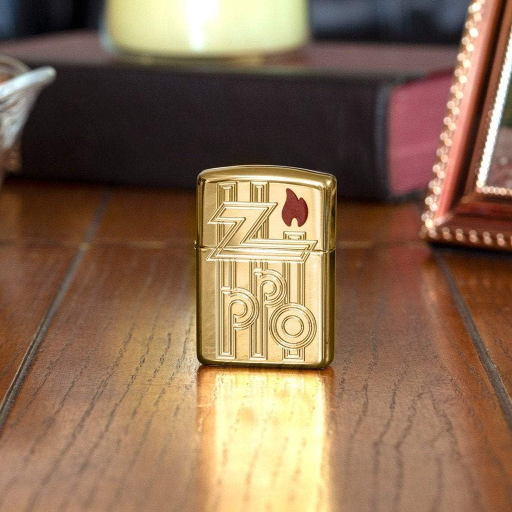 Lifestyle image of Armor® High Polished Brass Abstract Zippo Logo Windproof Lighter standing on a side stand