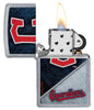 MLB® Cleveland Guardians™ Street Chrome™ Windproof Lighter with its lid open and lit.