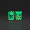 Lifestyle image of Zippo Trippy Skull Design Glow in the Dark 540 Color Windproof Lighter glowing in the dark.