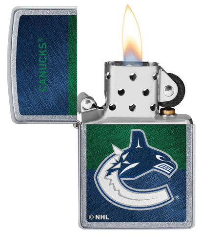 NHL® Vancouver Canucks Street Chrome™ Windproof Lighter with its lid open and lit