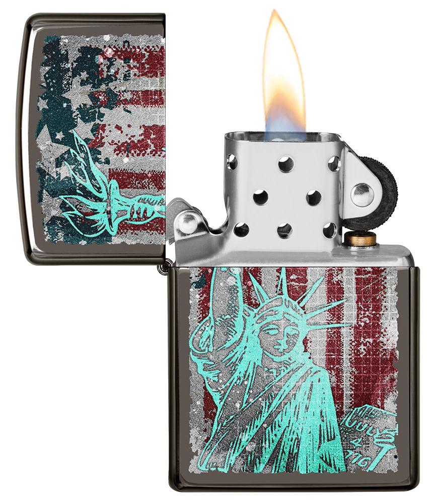 Statue Of Liberty Design Black Ice® Windproof Lighter with its lid open and lit.