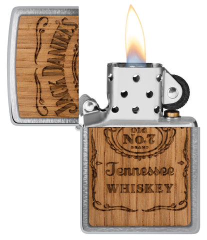 Zippo Jack Daniel's Woodchuck USA Brushed Chrome Windproof Lighter with its lid open and lit.