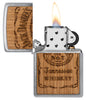 Zippo Jack Daniel's Woodchuck USA Brushed Chrome Windproof Lighter with its lid open and lit.