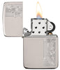 1941 Replica Sterling Silver Herringbone Filigree Design Windproof Lighter with its lid open and lit.