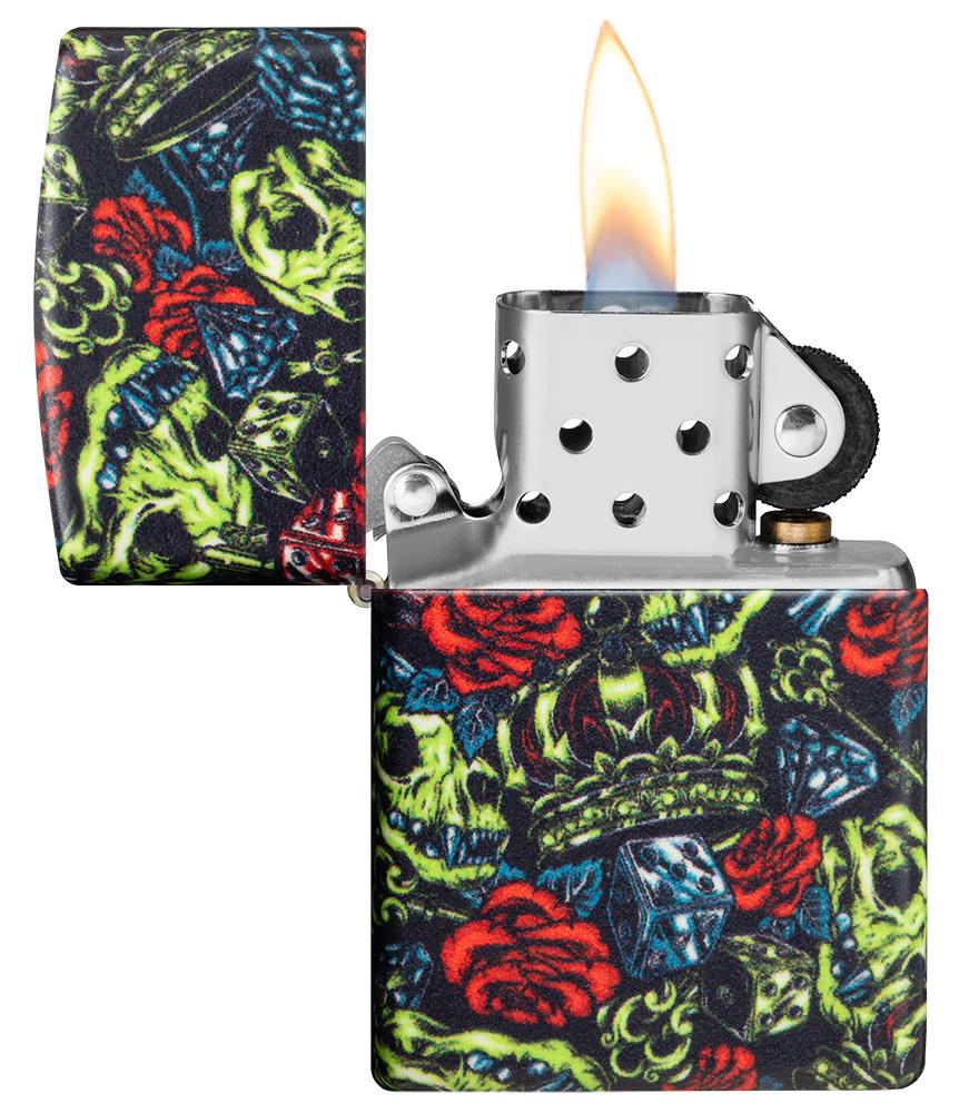 Skull Crown Glow-In-The-Dark 540 Color Windproof Lighter with its lid open and lit.