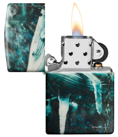 Zippo Spazuk Whale Design 540 Color Windproof Lighter with its lid open and lit.