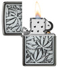 Cannabis Emblem Design Grey Windproof Lighter with its lid open and lit.