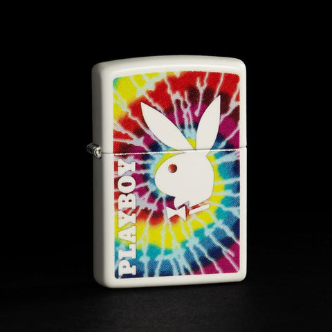 GIF of Playboy Tie-Dye Glow In the Dark Windproof Lighter switching from glowing in the dark to not glowing.