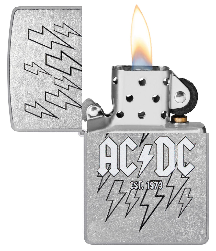 Zippo AC/DC Design Street Chrome Windproof Lighter with its lid open and lit.