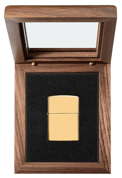 ArmorÂ® High Polish 18K Solid Gold Windproof Lighter in its luxury packaging.